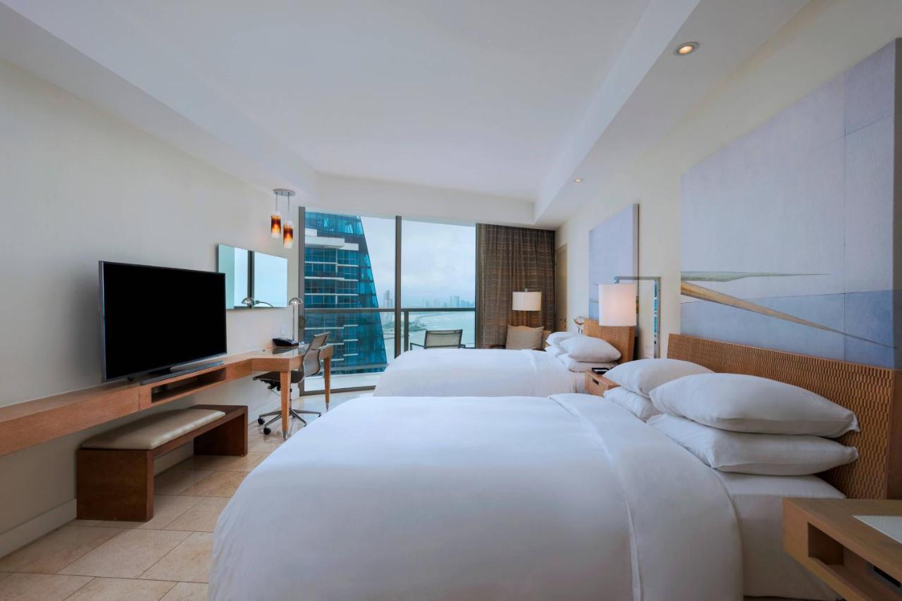 Guest room 2 double beds balcony partial ocean view,1739407625:JPEG