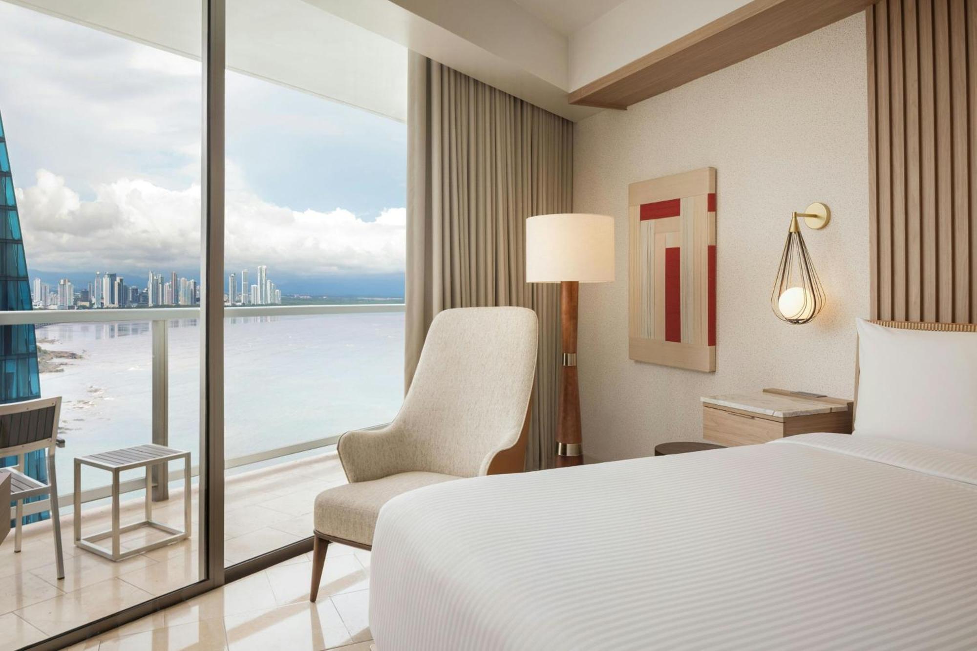 King Guest Room Balcony Partial Ocean View